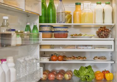 Fridge filled with fruits and vegetables